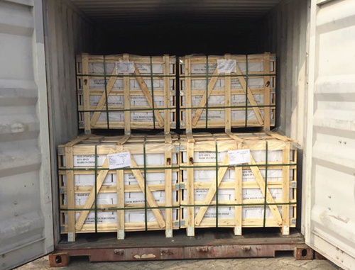 Three wooden crates stacked for storage and transportation.