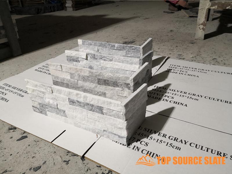 Alaska Gray split face corner stone with rugged texture