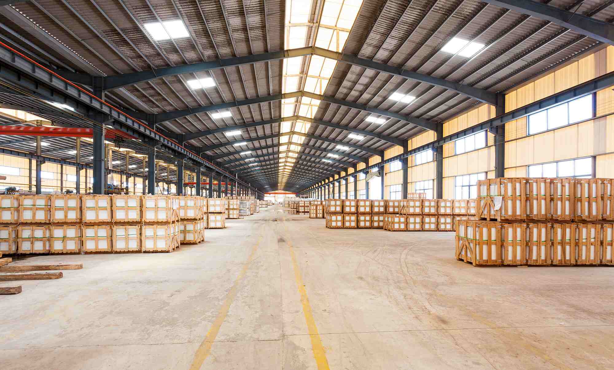 Inside view of Top Source Slate stacked stone warehouse showcasing various stone products.