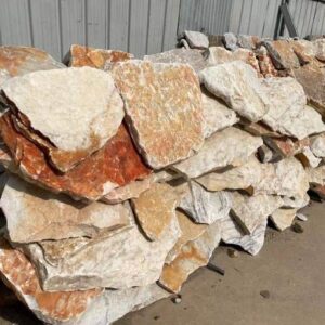 Beautiful installation of stacked stone wall panels in a modern interior design.