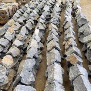 Close-up of an elegant stacked stone wall panel in various shades