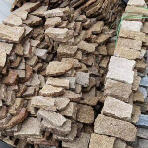 Close-up of an elegant stacked stone wall panel showcasing natural textures and colors