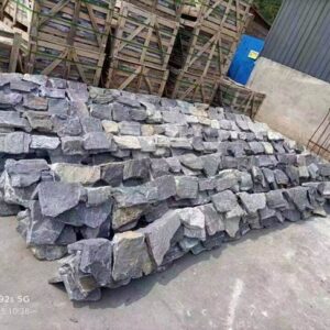 Elegant stacked stone panels in a modern setting, ideal for interior design and landscaping.