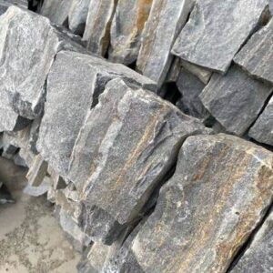 Close-up view of beautifully arranged stacked stone wall cladding