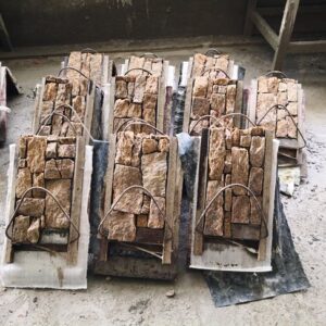 Corner piece of natural stacked stone cladding for walls