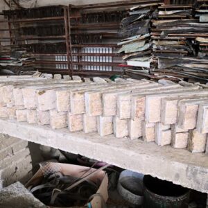 Corner piece for stone cladding showing textured surface