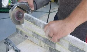 Expert cutting ledger stone panels with tools and techniques