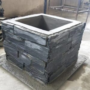 Beautiful stacked stone column made of natural stones