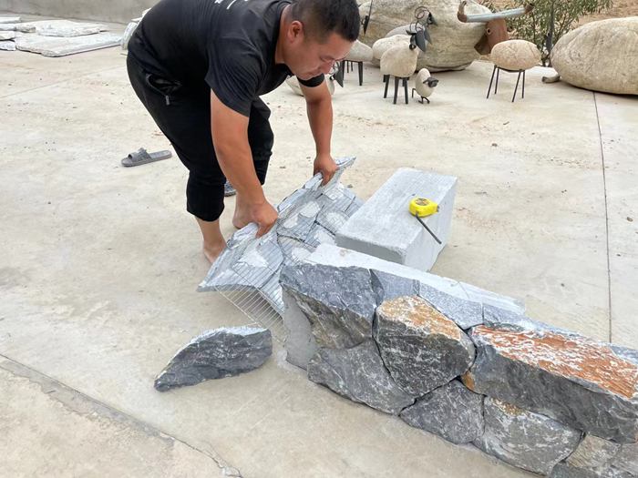 Beautifully designed stacked stone retaining wall showcasing natural textures
