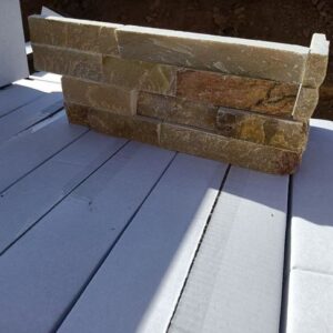 Beautiful corner installation of stacked stone panels in a natural setting