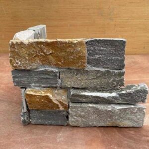 Elegant corner design featuring stacked stone panels in natural tones