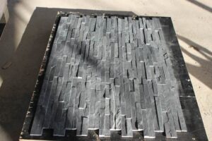 Interlocking stacked stone panels for wall cladding and decorative surfaces