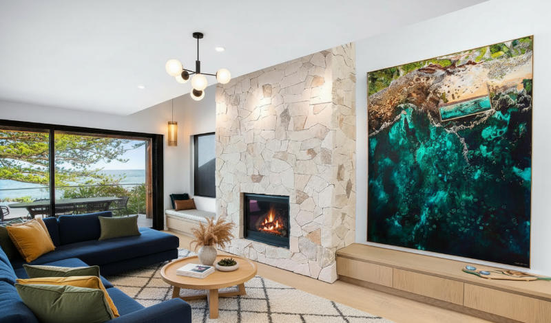 Worker preparing a stable substrate base for stacked stone veneer installation on a wall surface