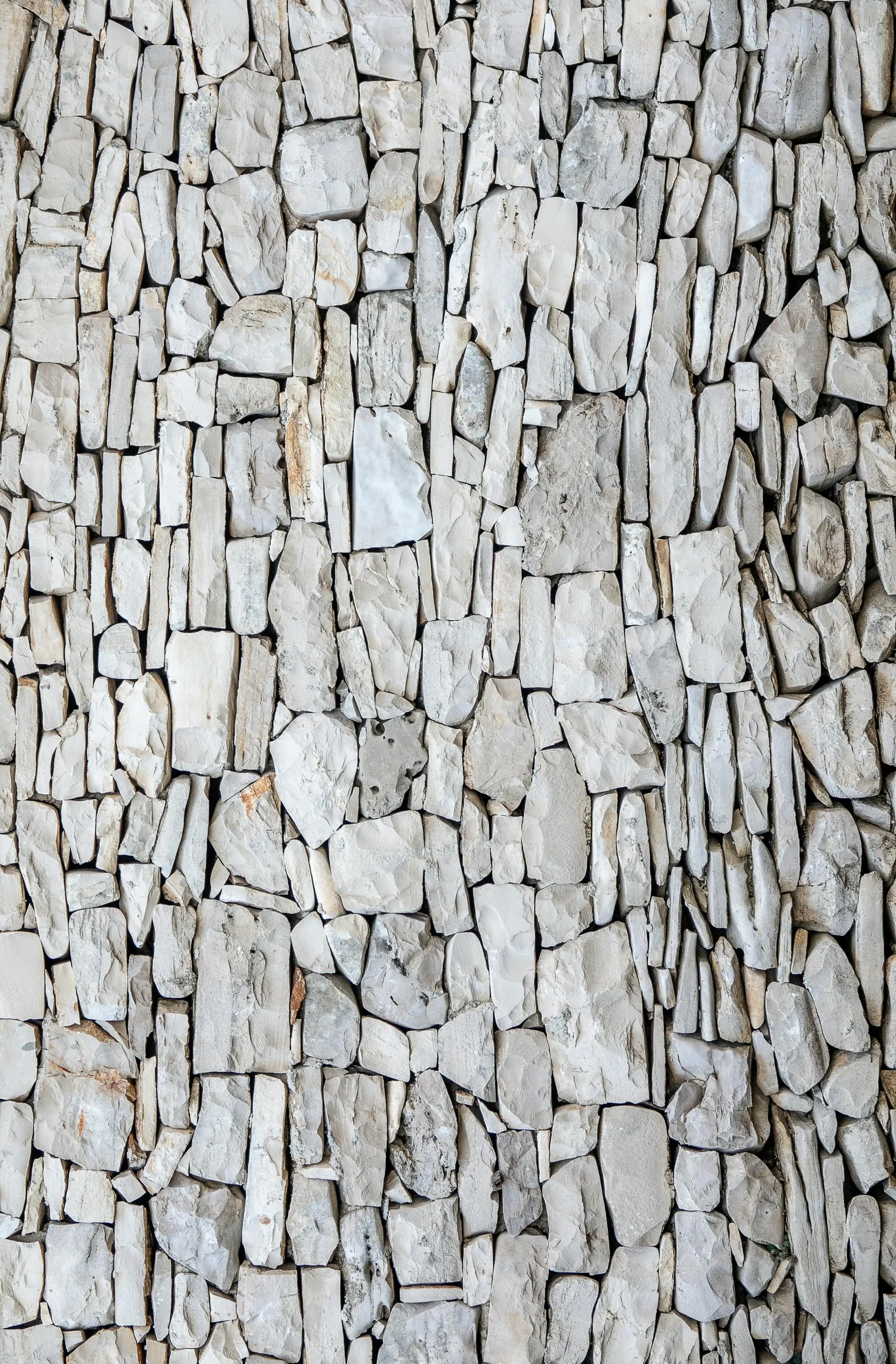 white stacked stone hotel facade