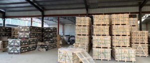 Pallets of stacked stone crated in the Top Source Stone export warehouse